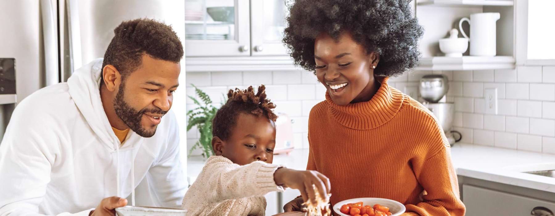 a family cooking together