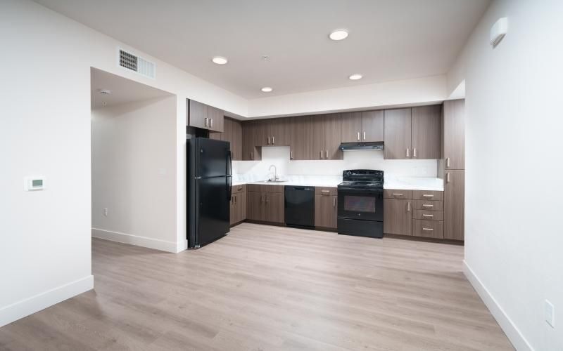 a kitchen with wooden floors
