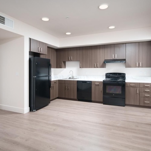 a kitchen with wooden floors